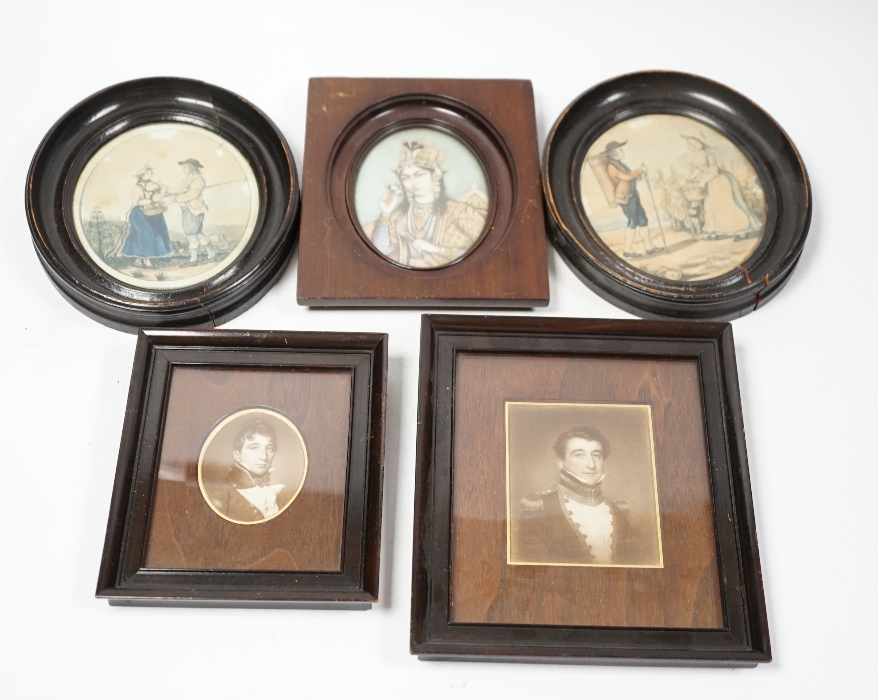 Five portrait miniatures comprising Indian watercolour on ivory, Portrait of a lady, two late 18th / early 19th century watercolours on card, Figures and two military style sepia prints, largest 12.5 x 10cm CITES Submiss